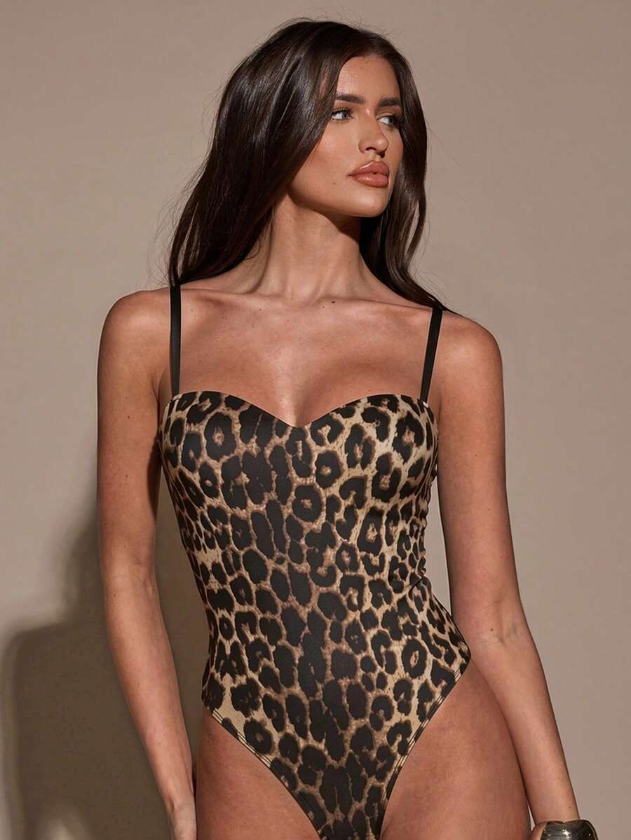 Apricot women's lace sheer camisole top featuring spaghetti straps, contrast lace trim, backless slim fit design, and knitted stretch fabric.