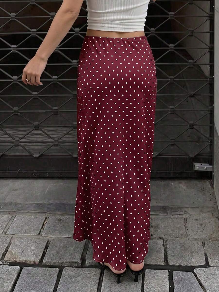 Women's white satin long dress featuring a high waist and elegant fishtail hem