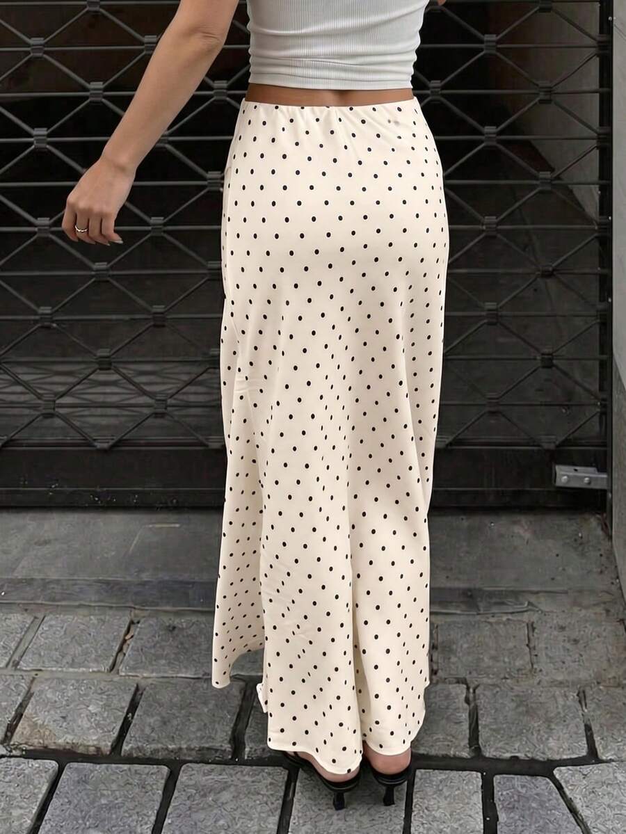 Women's white satin long dress featuring a high waist and elegant fishtail hem
