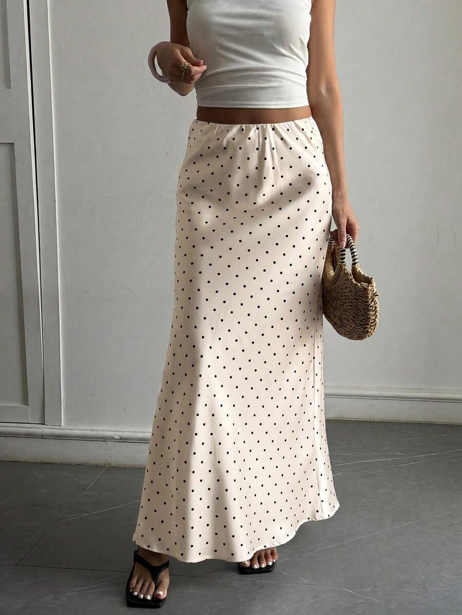 Women's white satin long dress featuring a high waist and elegant fishtail hem
