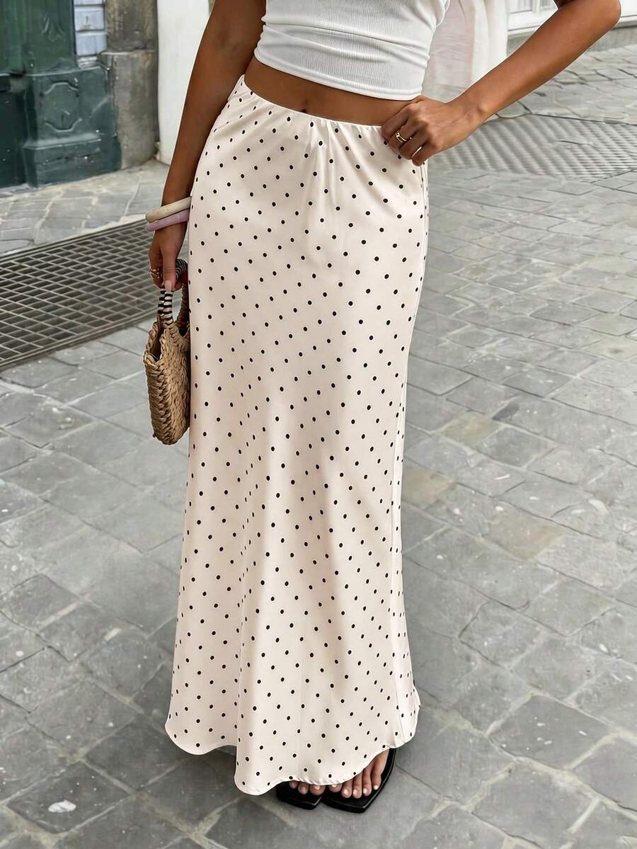 Women's white satin long dress featuring a high waist and elegant fishtail hem