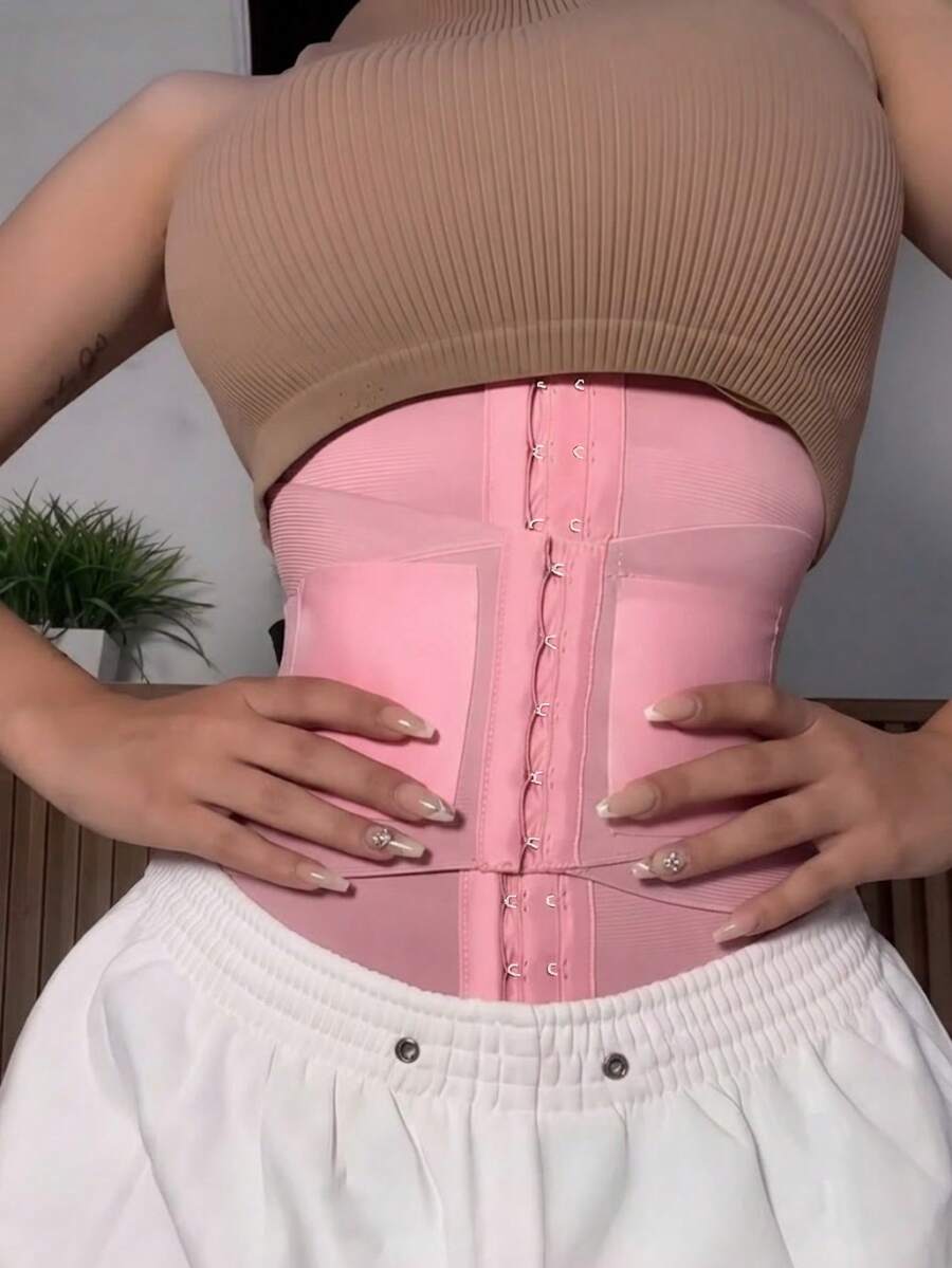 Women's high compression waist trainer and abdominal shaper belt designed for tummy support and daily wear.