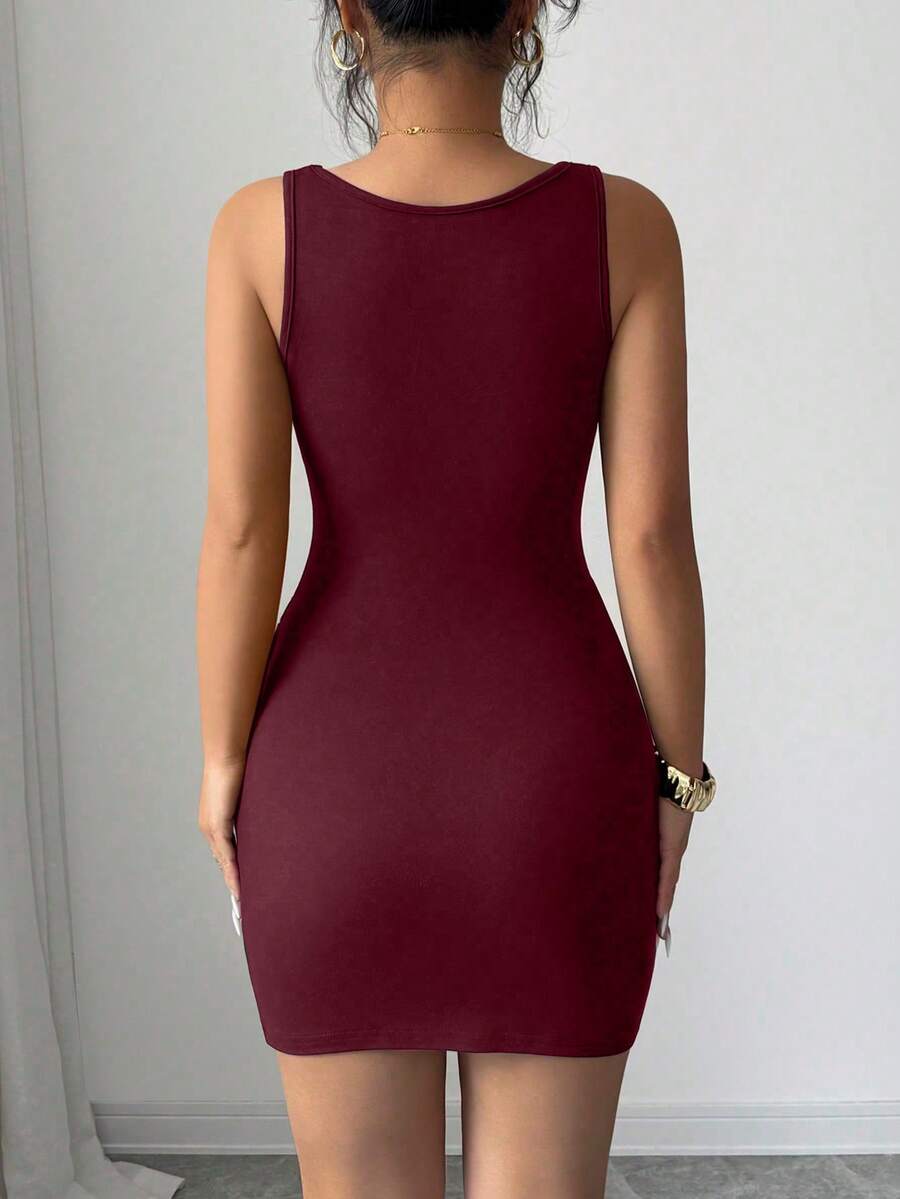 Sleeveless black bodycon mini dress featuring a square neckline, faux boning trim, and ruched waist detail.