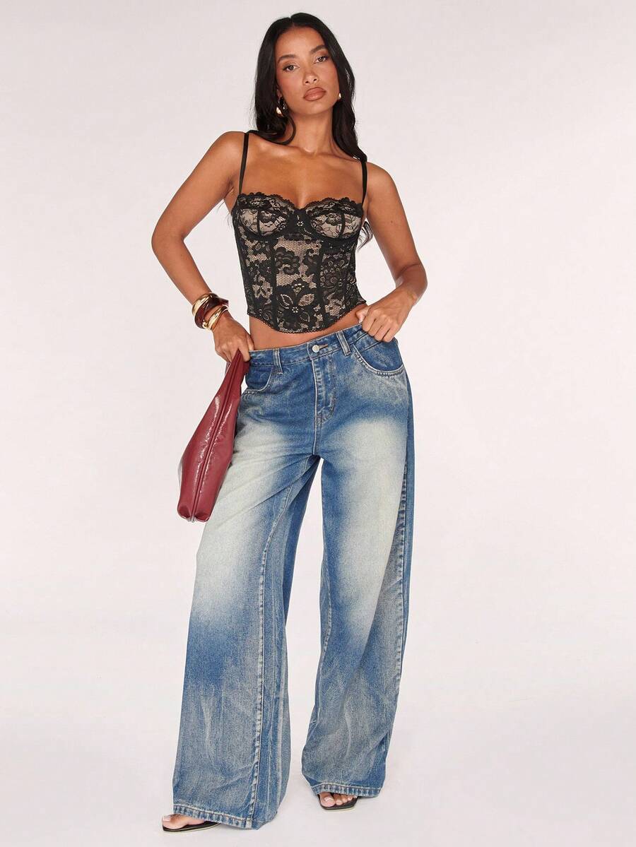 Women’s camisole top with cup detail, spaghetti straps, lined body, and slim fit design in knitted fabric with an asymmetrical hem.