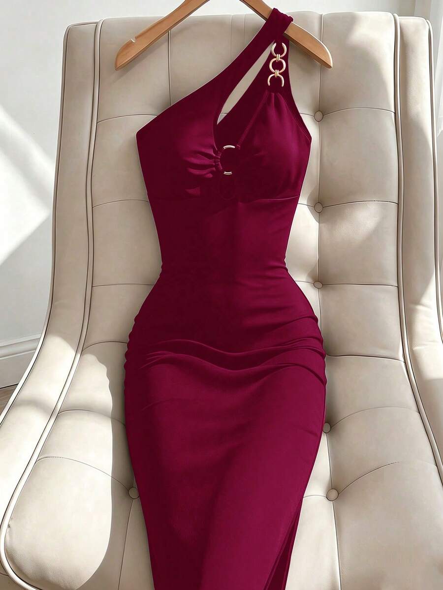 Sleeveless asymmetrical neck bodycon dress featuring cut-out waist detailing and side slit hem for women.