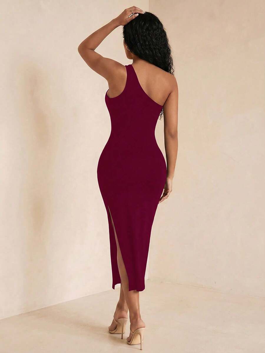 Sleeveless asymmetrical neck bodycon dress featuring cut-out waist detailing and side slit hem for women.