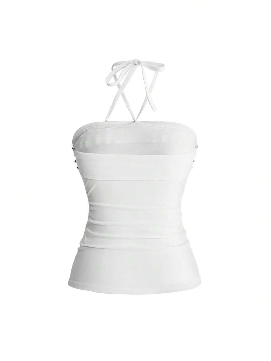 Women's sleeveless halter cropped camisole top in black with graphic slogan print and studded detailing.