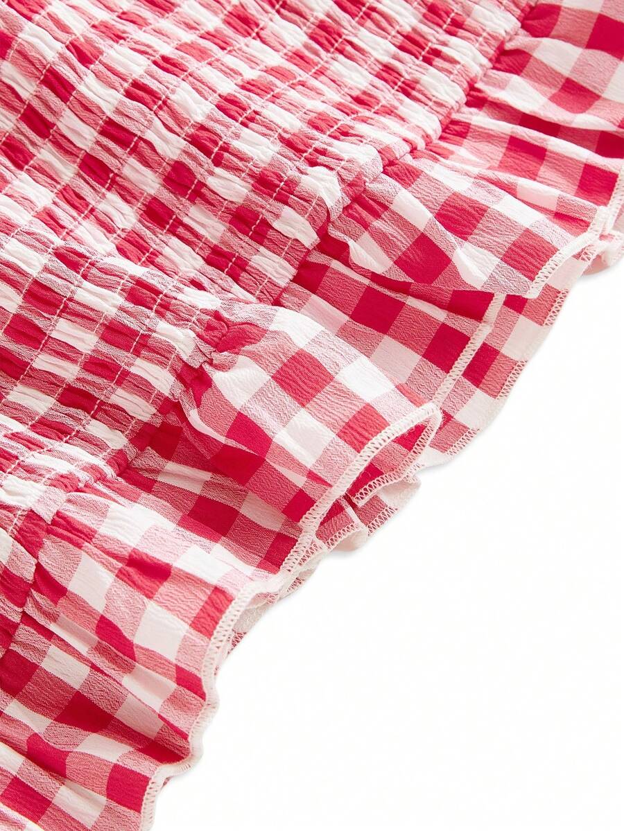 Pink plaid backless halter camisole set with ruched bust, knot detail, and ruffle hem for women.