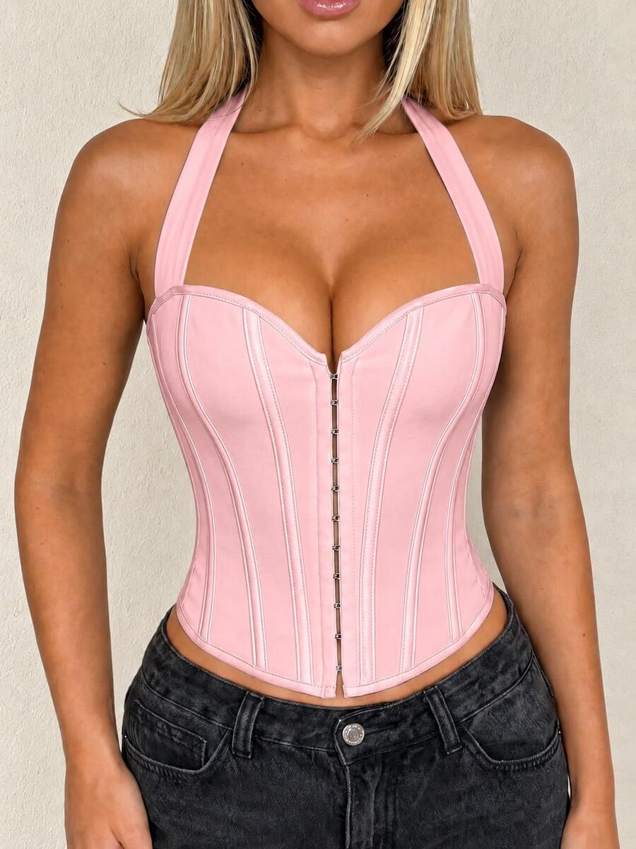 White Y2K halter backless corset top featuring lace-up back detail and metal grommet eyelets for women
