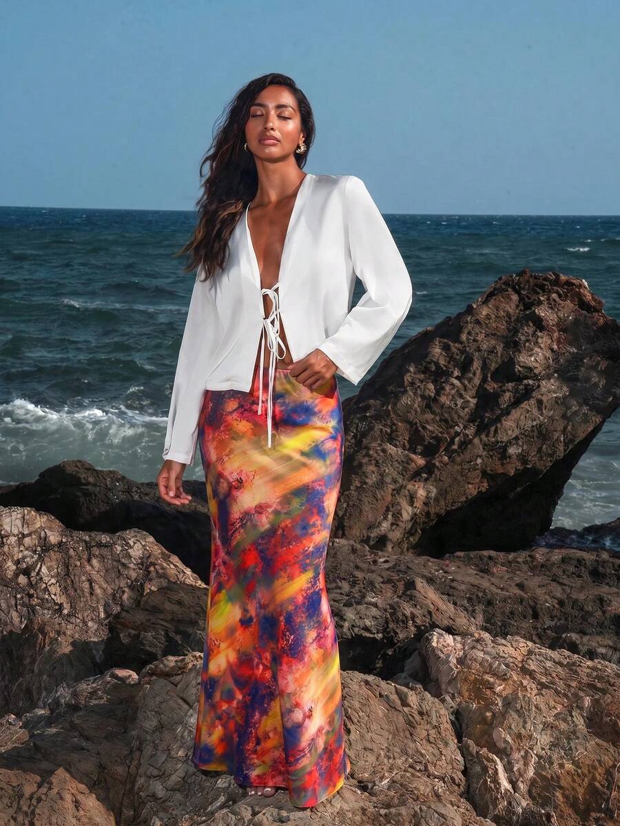 Women's black woven mermaid maxi skirt featuring a solid color design, mid waist, and 100% cotton fabric.