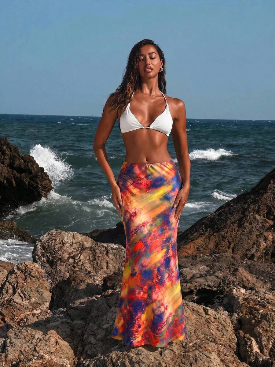 Women's black woven mermaid maxi skirt featuring a solid color design, mid waist, and 100% cotton fabric.