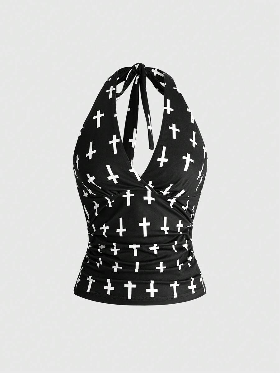 Women's halter crop tank top featuring a backless silhouette and ruched detailing in a slim fit design.