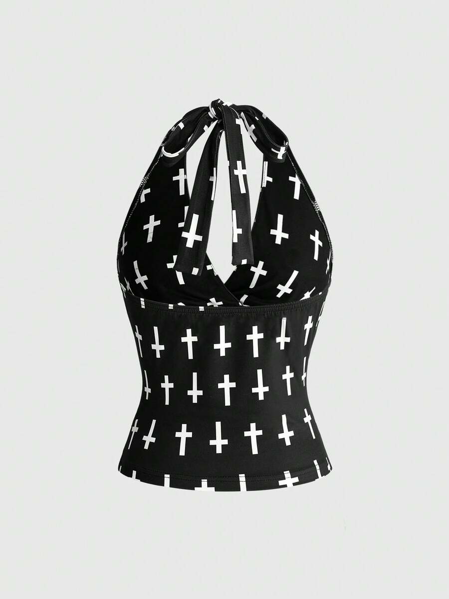 Women's halter crop tank top featuring a backless silhouette and ruched detailing in a slim fit design.