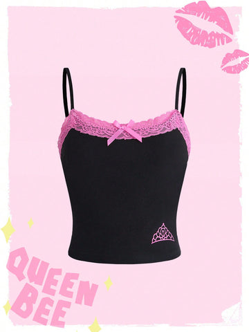Black women's micro crop cami top featuring graphic crown print, contrast lace trim, bow detail, and spaghetti straps.