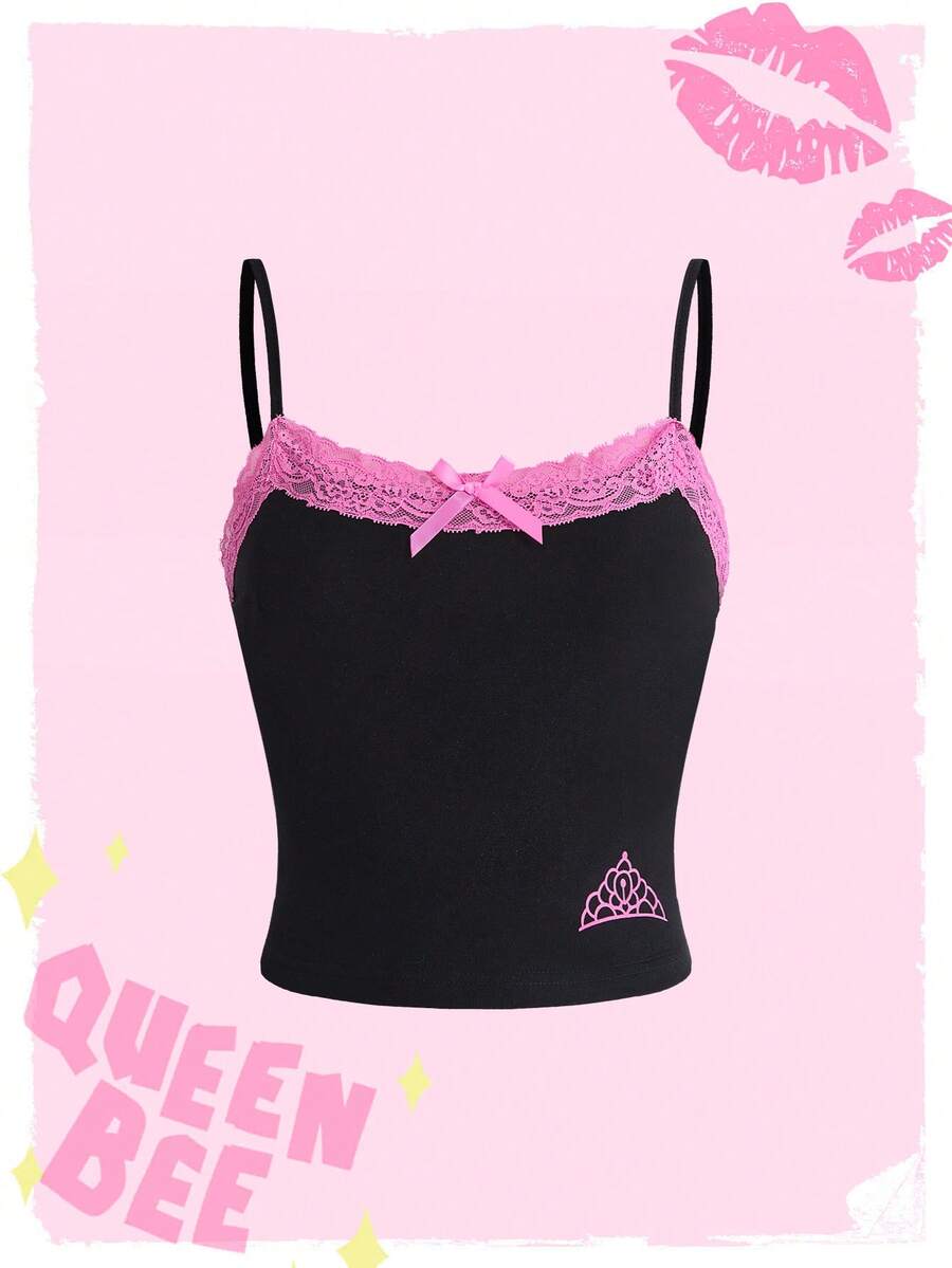 Black women's micro crop cami top featuring graphic crown print, contrast lace trim, bow detail, and spaghetti straps.