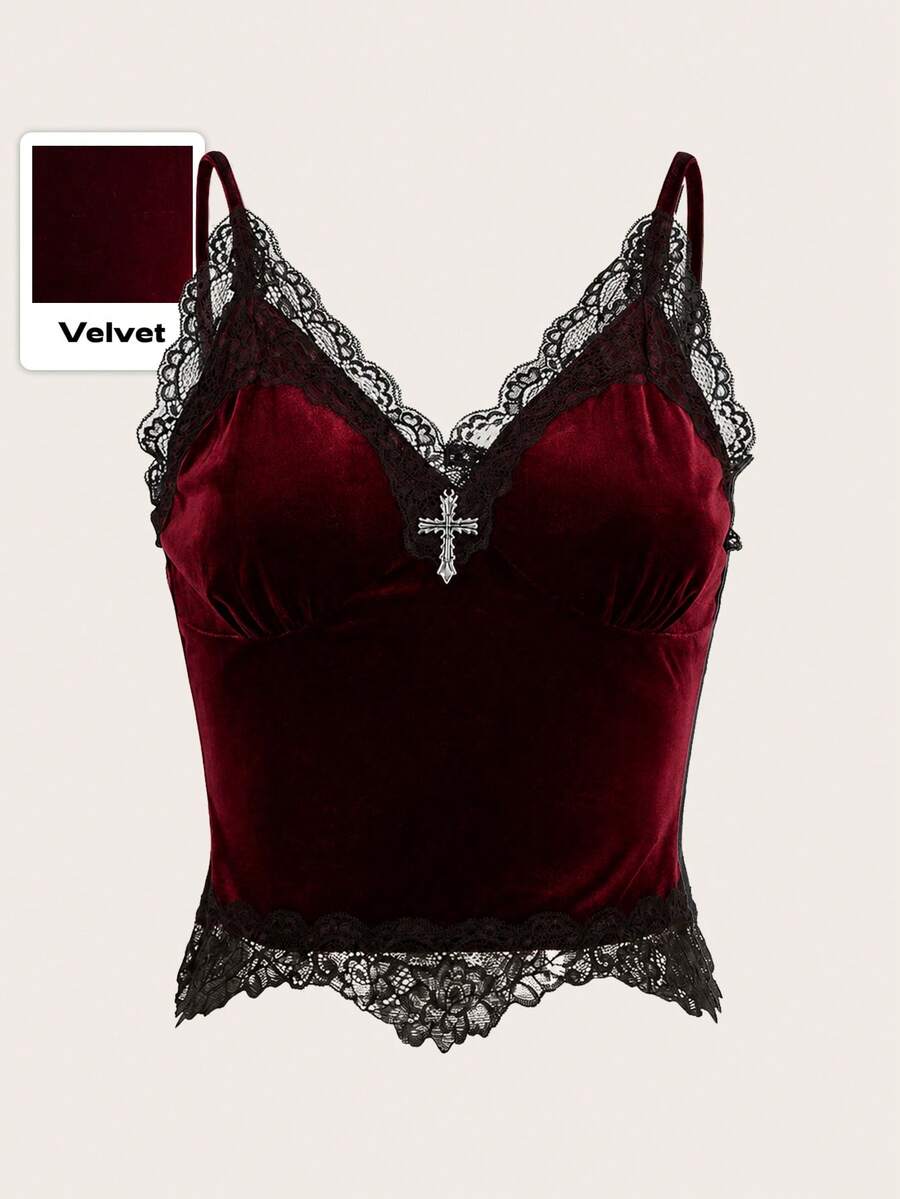Black gothic velvet crop tank top for women featuring contrast lace trim, bow accent, spaghetti straps, and a metal cross detail.
