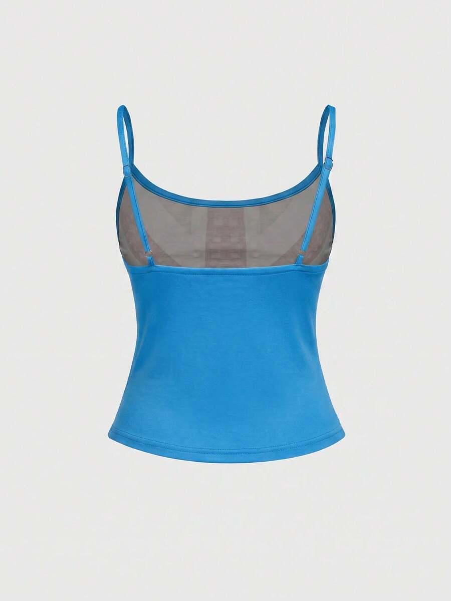 Black spaghetti strap crop camisole top for women featuring a vintage UK flag print with rhinestone and rivet details.