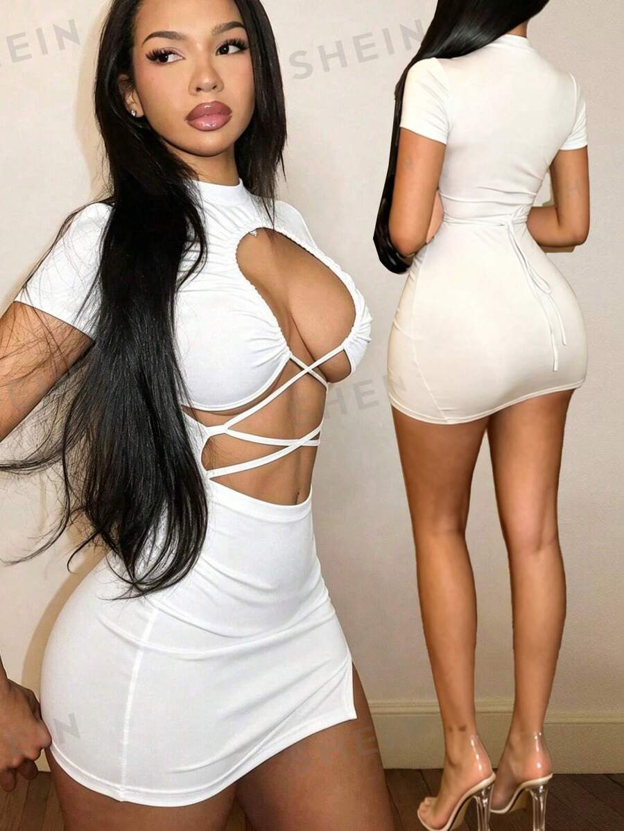 Women's short sleeve bodycon mini dress in black featuring a stand collar, criss cross front detailing, and an asymmetrical hemline.