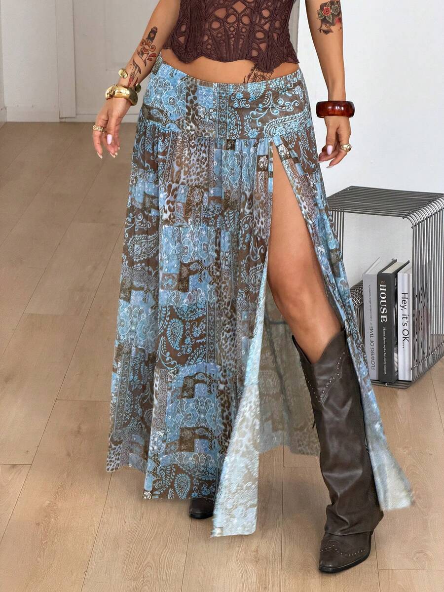 Women's blue and brown graphic print long flared skirt with low waist, split thigh detail, and textured semi-sheer fabric.