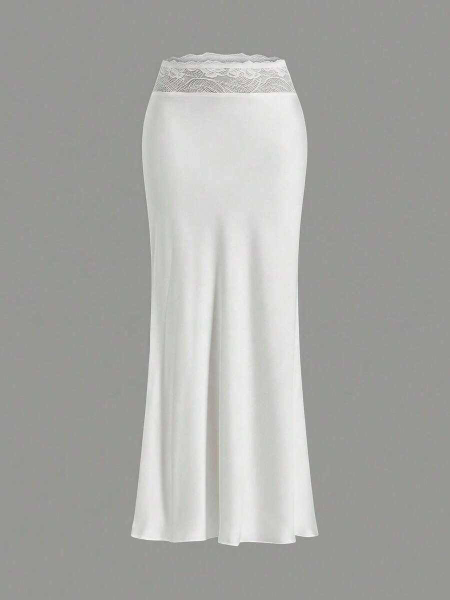 Women's black woven mermaid maxi skirt featuring a solid color design, mid waist, and 100% cotton fabric.