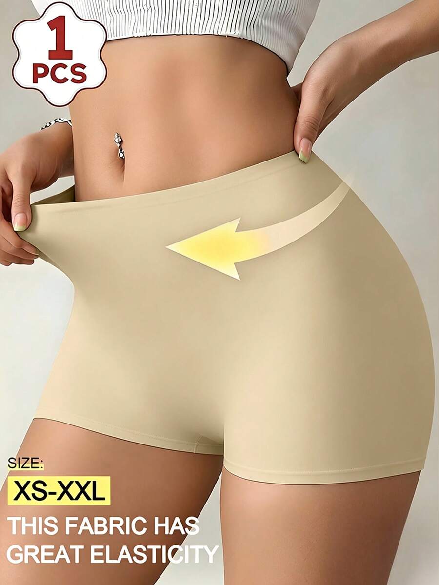 Women's black high stretch shapewear shorts with a mid waist fit and semi-sheer fabric.