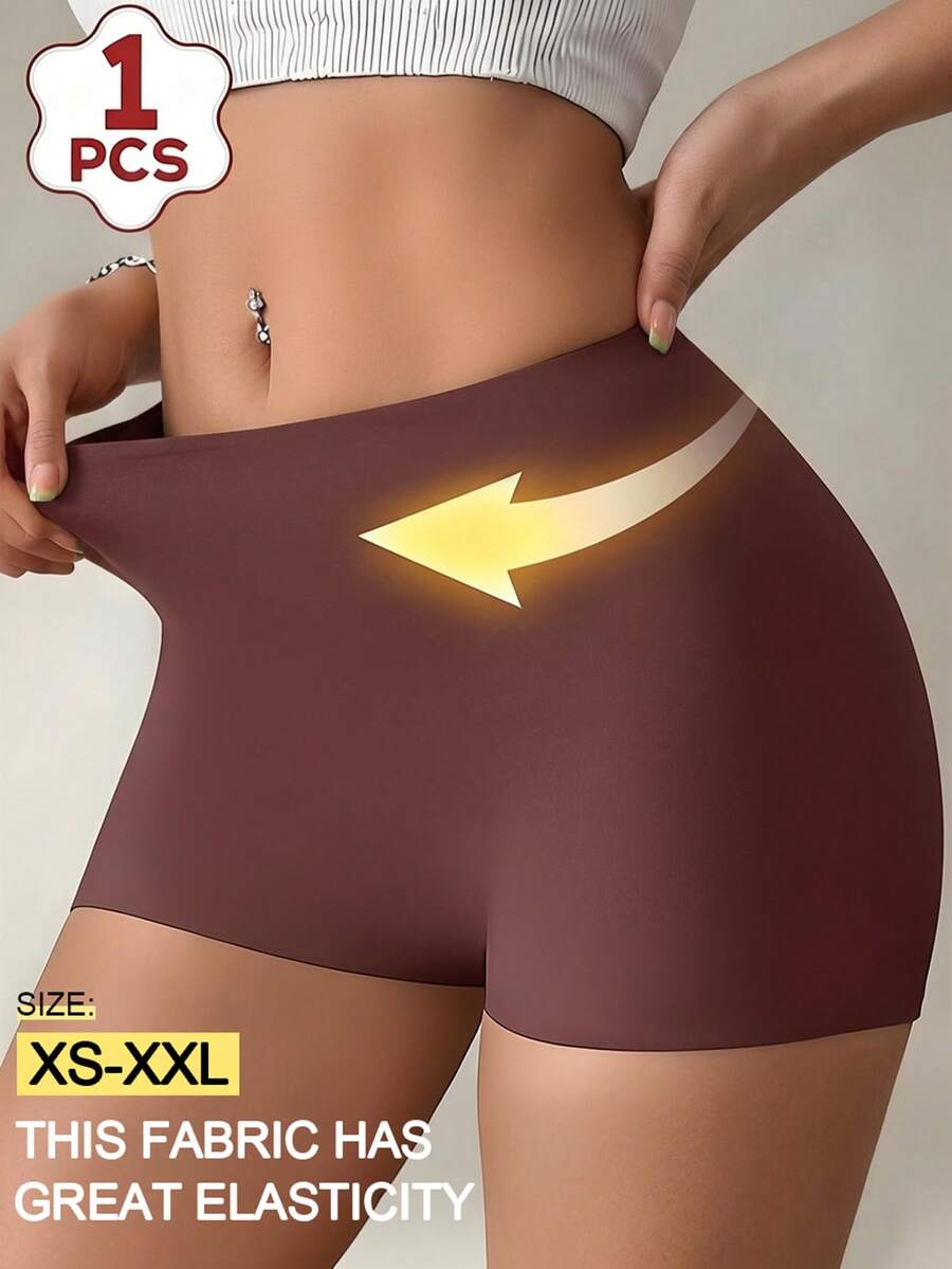 Women's black high stretch shapewear shorts with a mid waist fit and semi-sheer fabric.