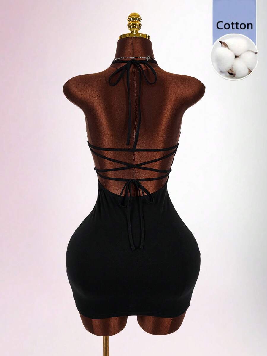Black sleeveless lace trim bodycon mini dress featuring spaghetti straps, front cutout detail, and semi-sheer contrast lace accents on a slim fit knitted silhouette.