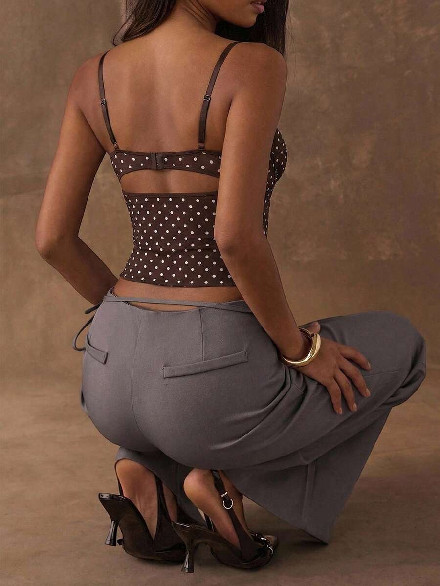 Women's black contrast lace camisole with spaghetti straps, cup detail, semi-sheer finish, and slim fit for going out or date night.