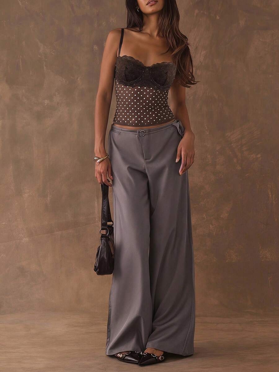 Women's black contrast lace camisole with spaghetti straps, cup detail, semi-sheer finish, and slim fit for going out or date night.