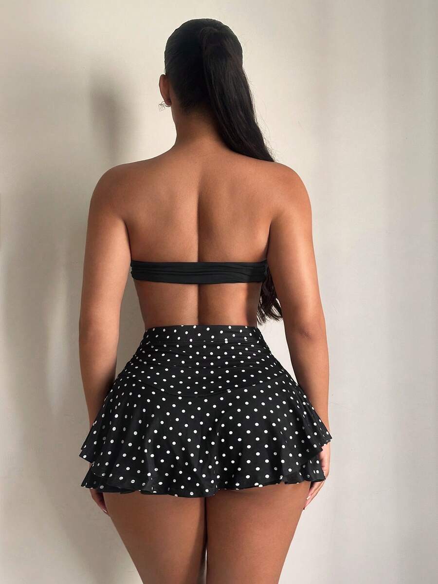 Black high waist ruffle hem skort for women featuring an elastic waistband and lined design.