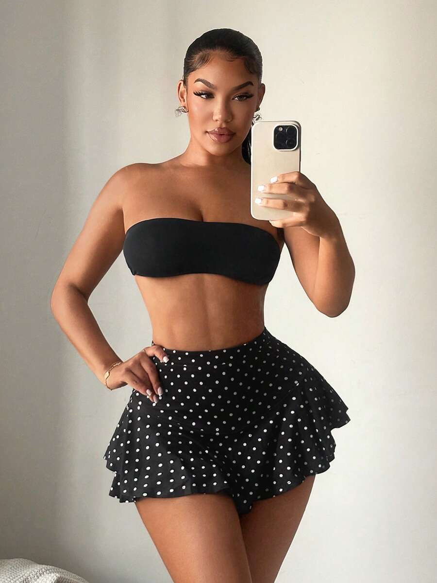 Black high waist ruffle hem skort for women featuring an elastic waistband and lined design.
