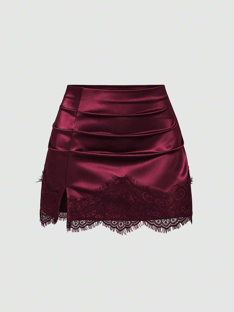 Black satin bodycon short skirt featuring contrast lace trim and mid-waist fit for women