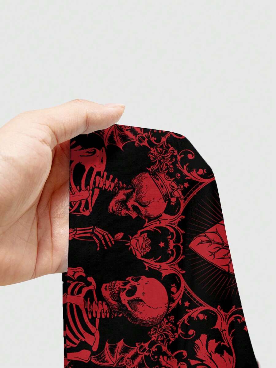 Black rib-knit gothic camisole tank top with a heart skull graphic print, spaghetti straps, and matching separate arm sleeves.