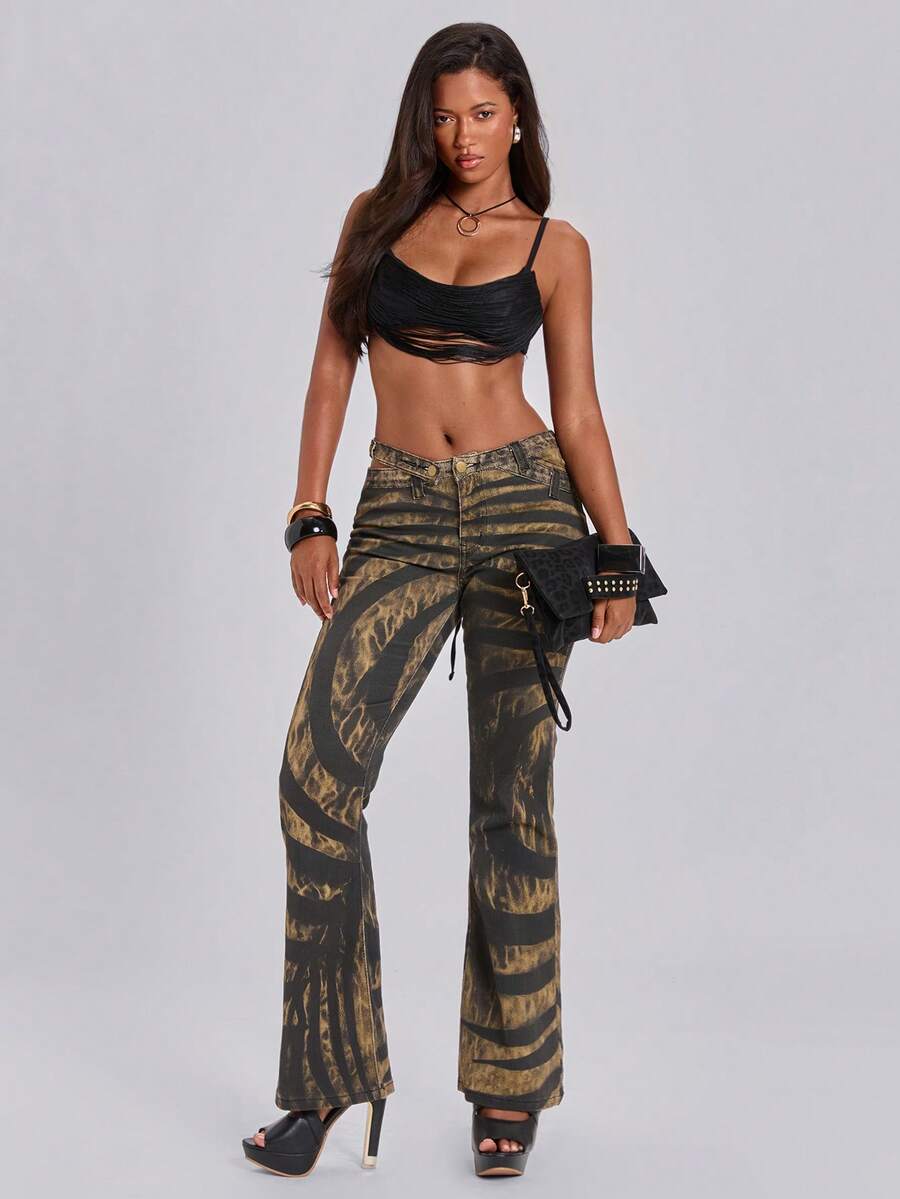 Black micro crop camisole bra featuring spaghetti straps, criss-cross ruched front detailing, and an asymmetrical hem.