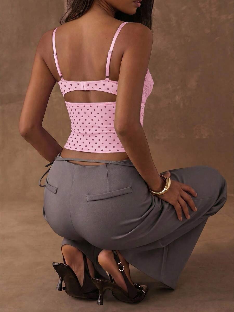 Women's black contrast lace camisole with spaghetti straps, cup detail, semi-sheer finish, and slim fit for going out or date night.