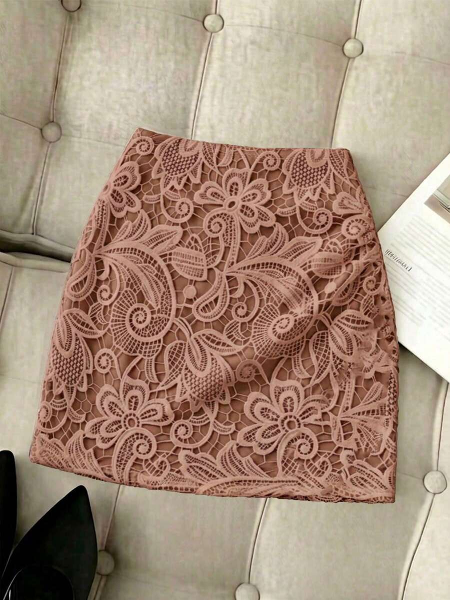 Women's short guipure lace skirt with lettuce trim and skinny mid-waist fit.