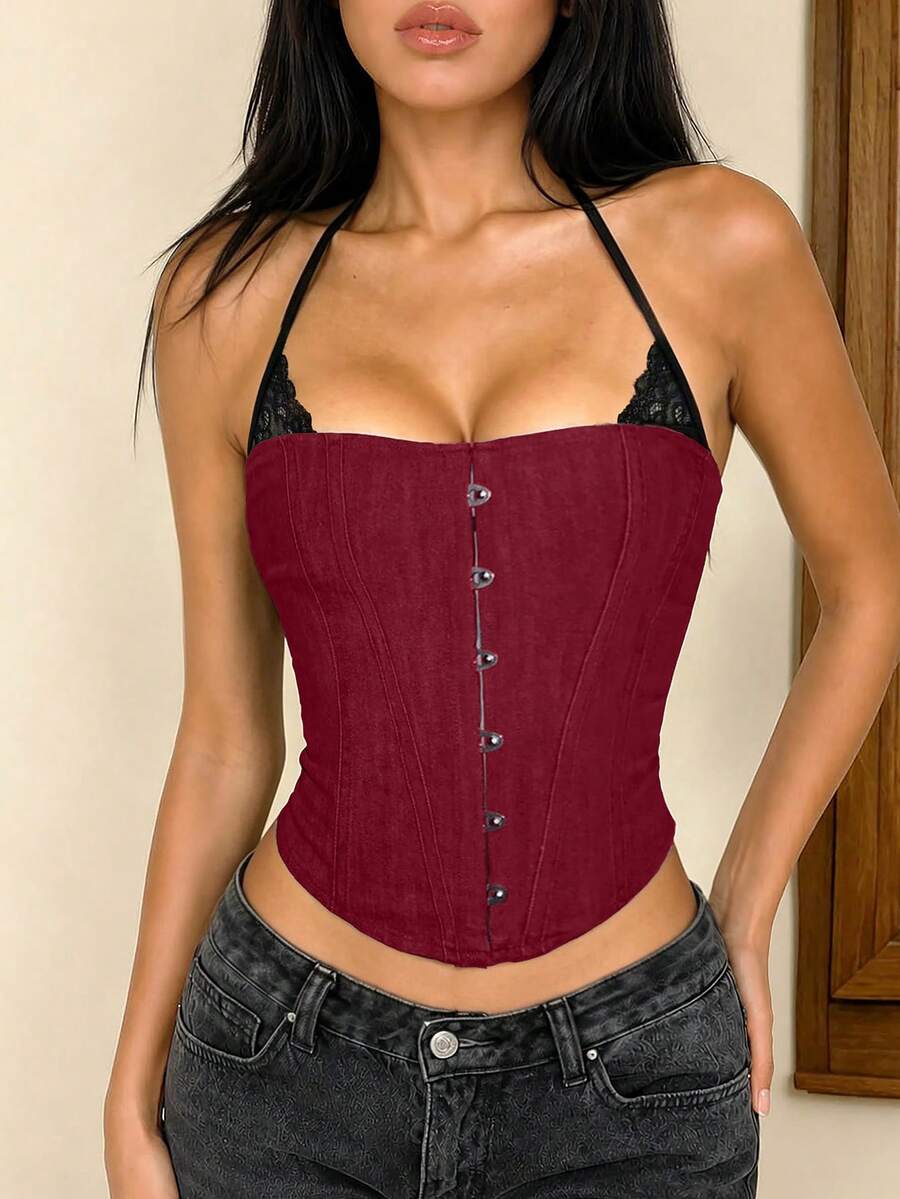 Black Y2K fitted corset crop top featuring a halter neckline, backless design, front hook closure, and back lace-up detail.