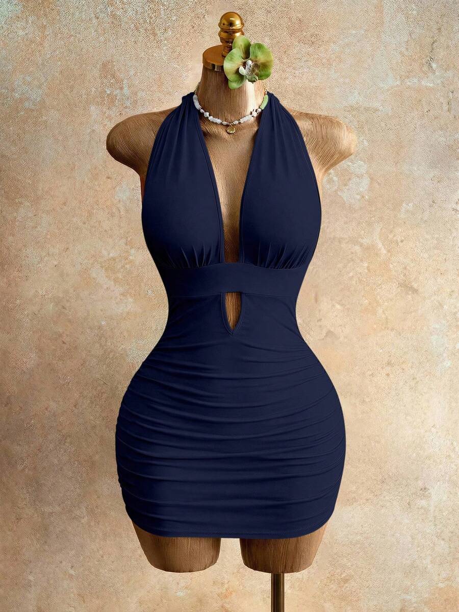 Sleeveless women's halter backless bodycon mini dress featuring lace-up knot back details and a high-waist pencil hem.
