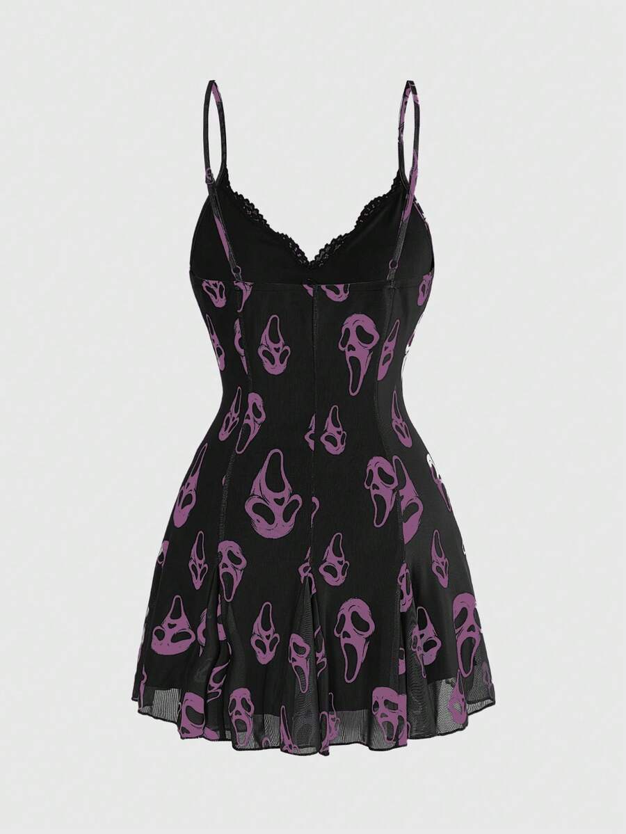 Women's black and white gothic cami mini dress featuring contrast lace trim, pleated details, high waist, and flared hem on high-stretch fabric.