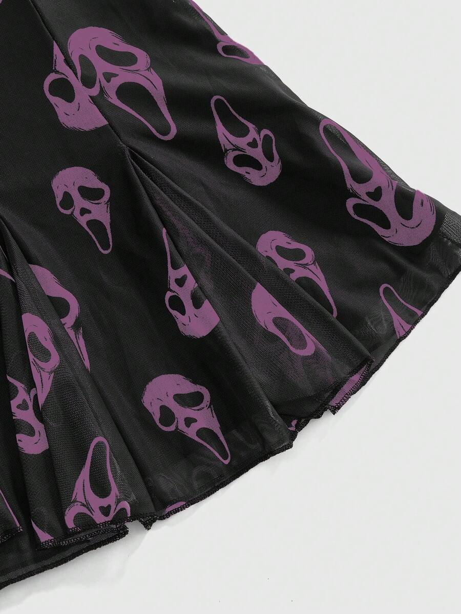 Women's black and white gothic cami mini dress featuring contrast lace trim, pleated details, high waist, and flared hem on high-stretch fabric.
