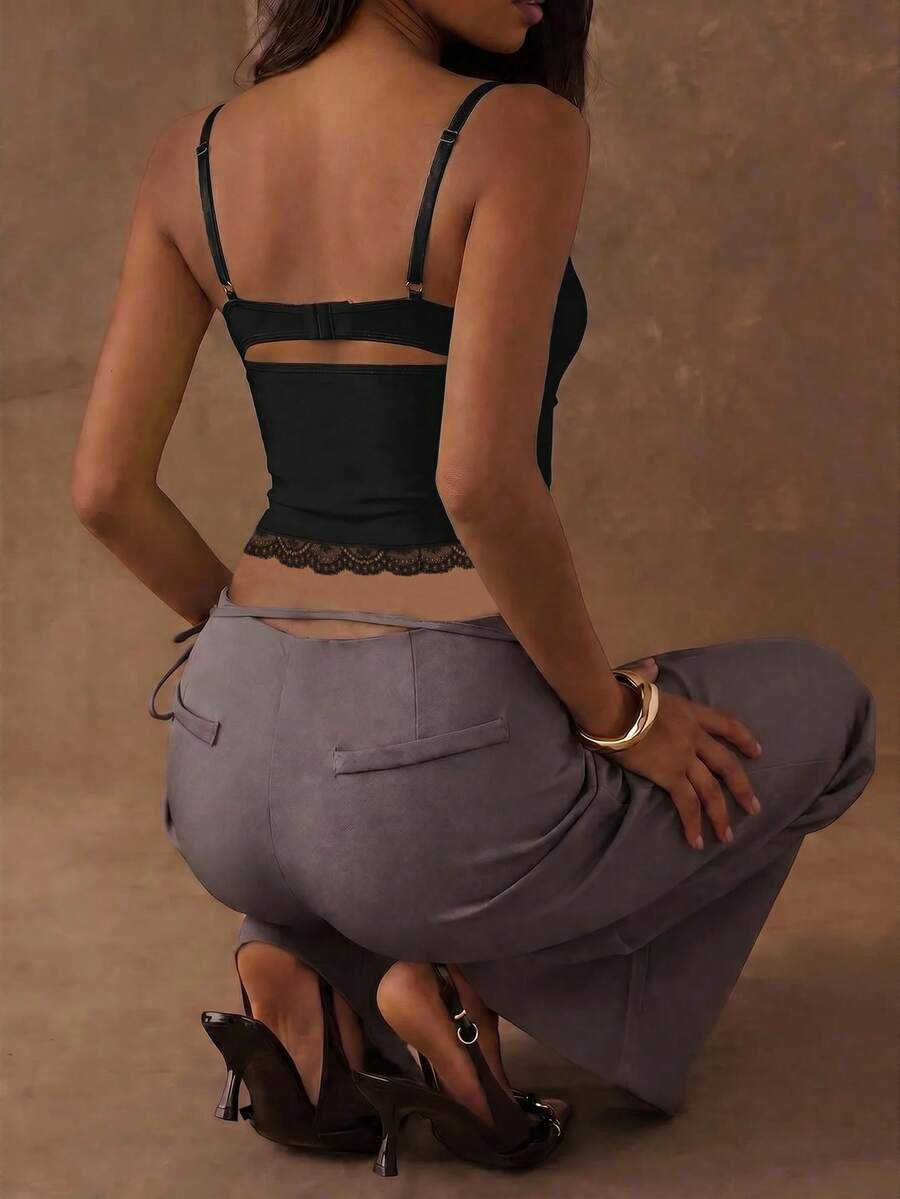 Women's black contrast lace camisole with spaghetti straps, cup detail, semi-sheer finish, and slim fit for going out or date night.