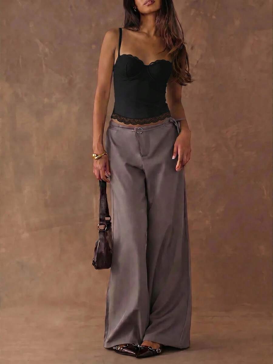 Women's black contrast lace camisole with spaghetti straps, cup detail, semi-sheer finish, and slim fit for going out or date night.