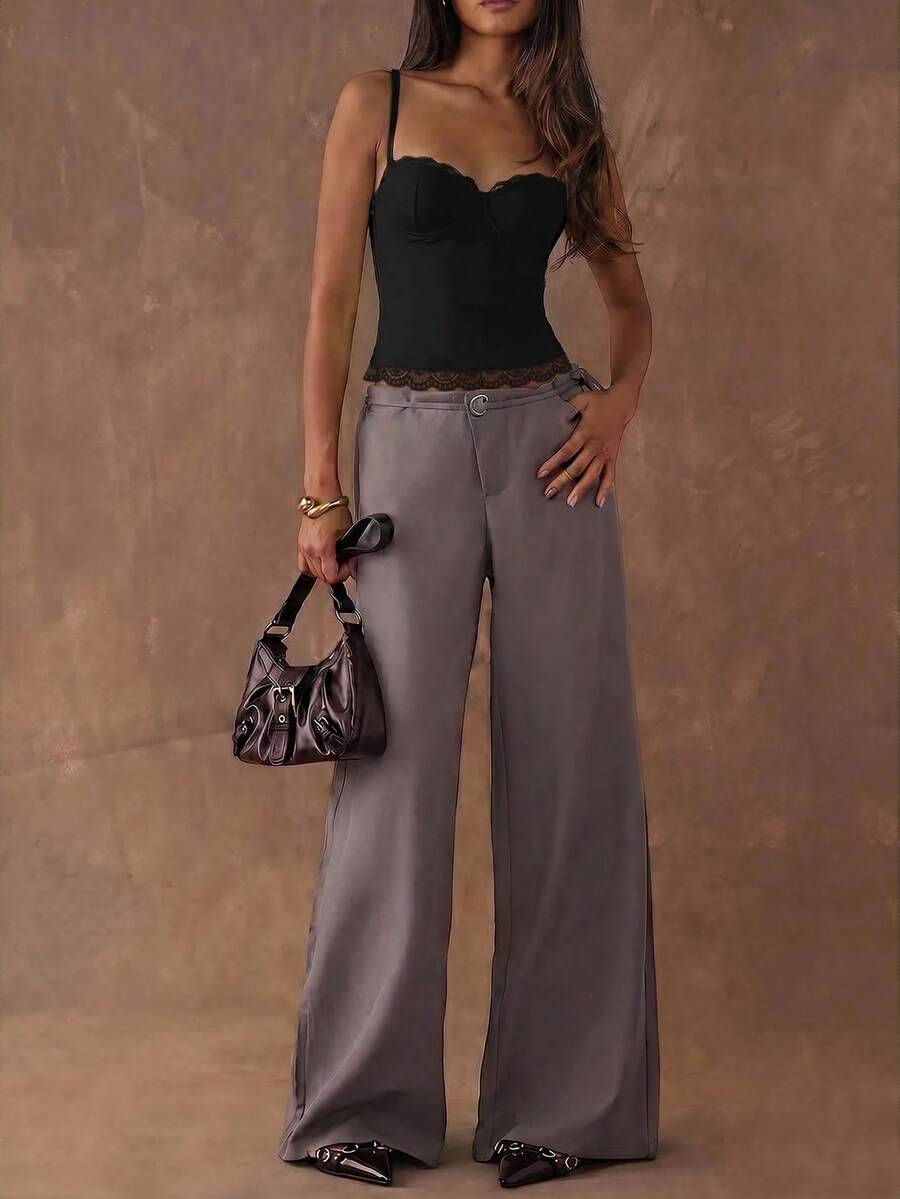 Women's black contrast lace camisole with spaghetti straps, cup detail, semi-sheer finish, and slim fit for going out or date night.