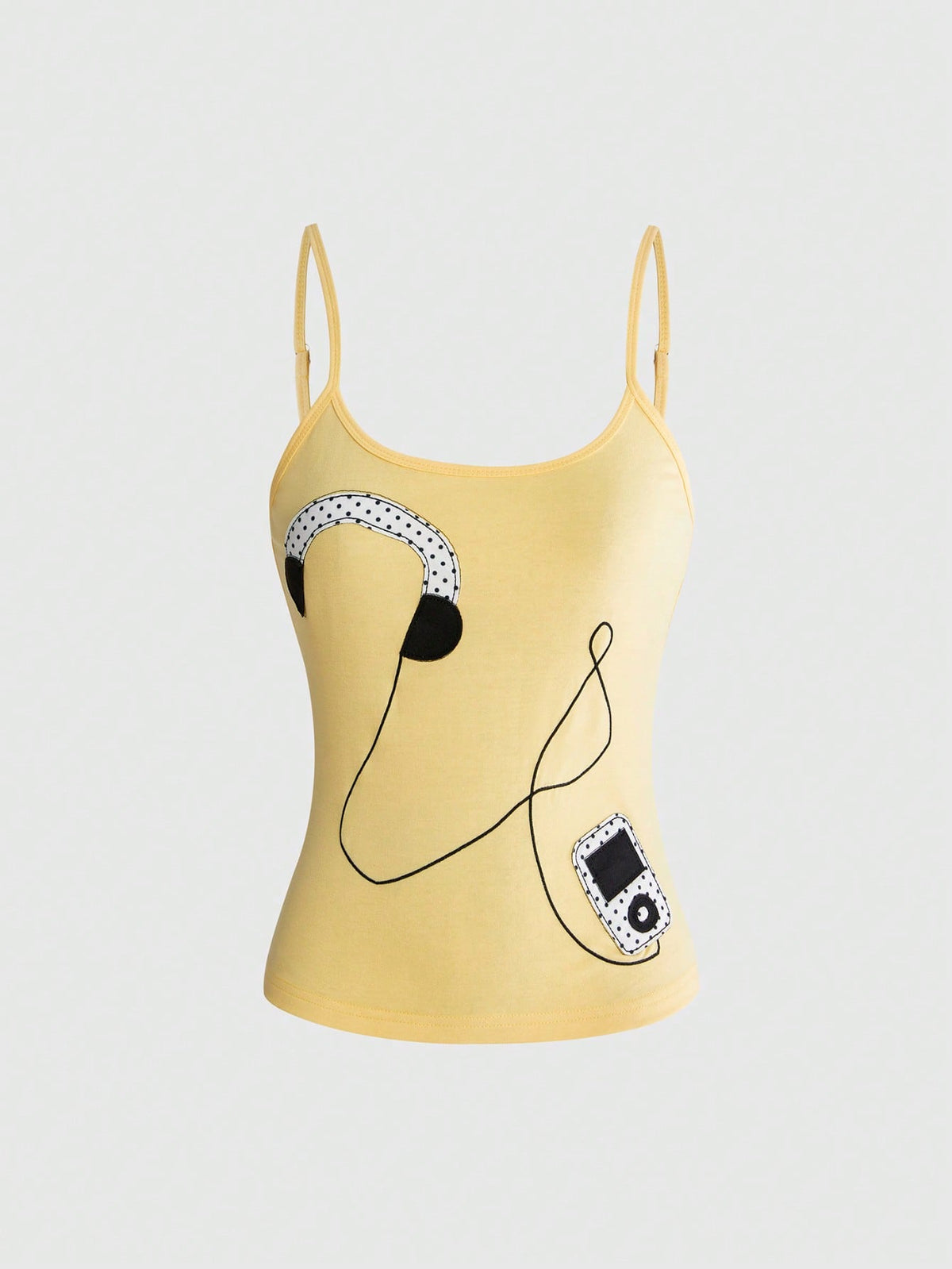 Women's white graphic tank top featuring a cartoon 3D applique patch with a slim fit sleeveless cut.