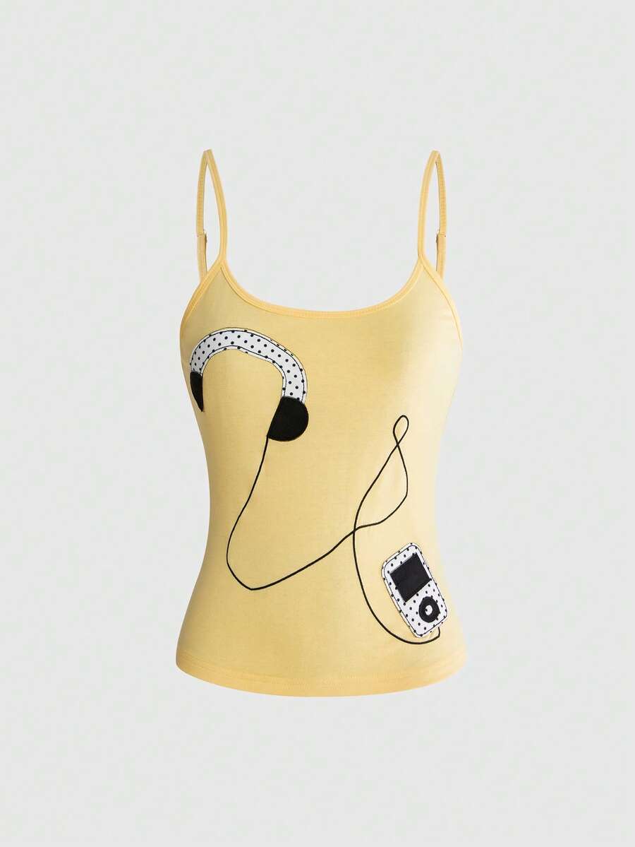 Women's white graphic tank top featuring a cartoon 3D applique patch with a slim fit sleeveless cut.