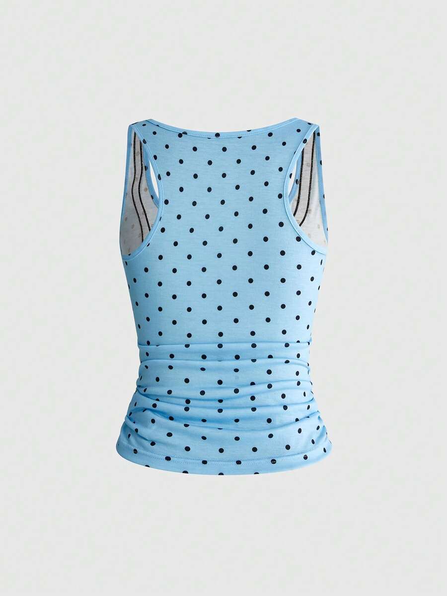 White slim fit square neck polka dot camisole top featuring cat and butterfly graphic print with studded arm sleeves.