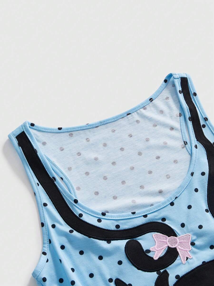 White slim fit square neck polka dot camisole top featuring cat and butterfly graphic print with studded arm sleeves.