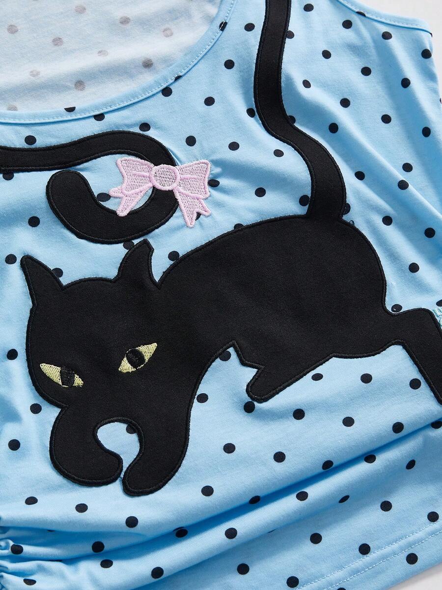 White slim fit square neck polka dot camisole top featuring cat and butterfly graphic print with studded arm sleeves.