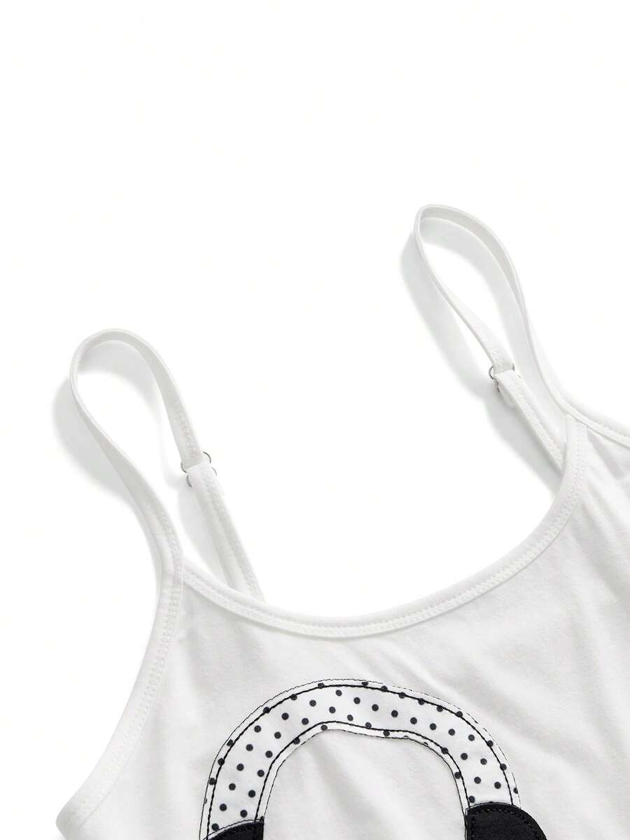 Women's white graphic tank top featuring a cartoon 3D applique patch with a slim fit sleeveless cut.