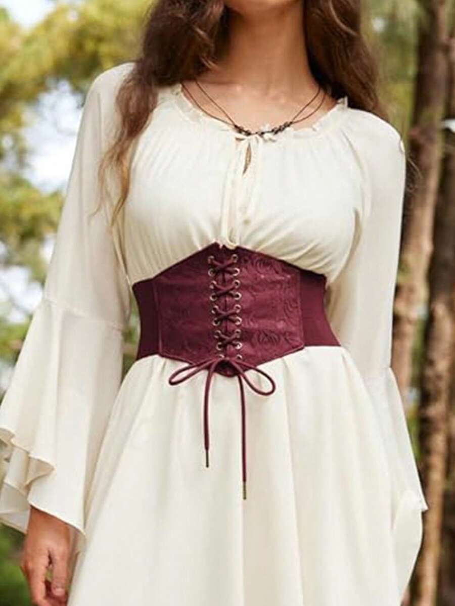 Black lace-up waist cincher with grommet eyelets, baroque pattern, medium stretch, and wide belt design for women.